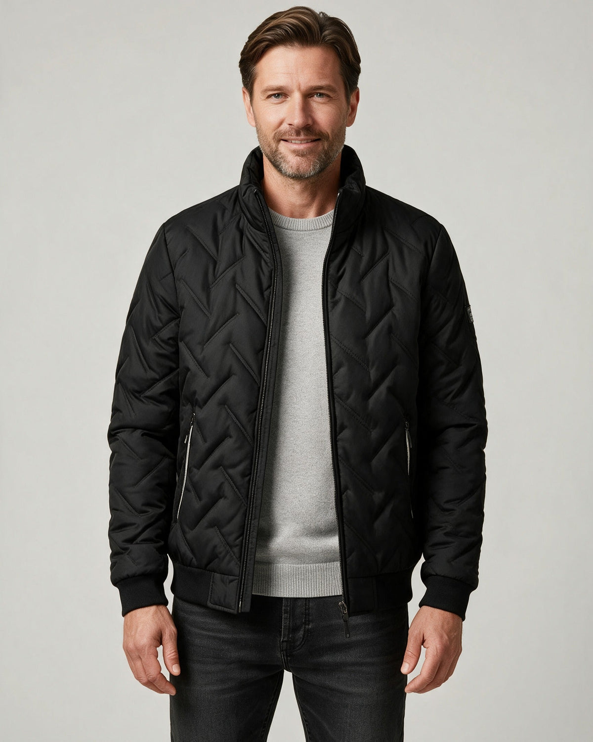 Lars quilted bomber jacket in black, front view